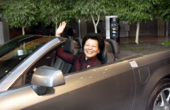 Chinese Vice Minister of Commerce Ma Xiuhong in the Cadillac XLR