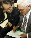 General Motors Vice Chairman Robert Lutz and Subaru Chairman Kyoji Takenaka