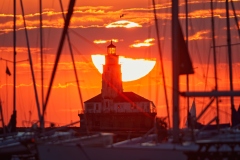 Sunrise behind the Chicago Harbor Lighthouse